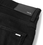 AMIRI - MX2 Skinny-Fit Panelled Distressed Stretch-Denim Jeans - Black