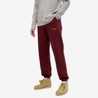 Sporty & Rich Men's Classic Logo Sweat Pant in Burgundy/Gold Embroidery