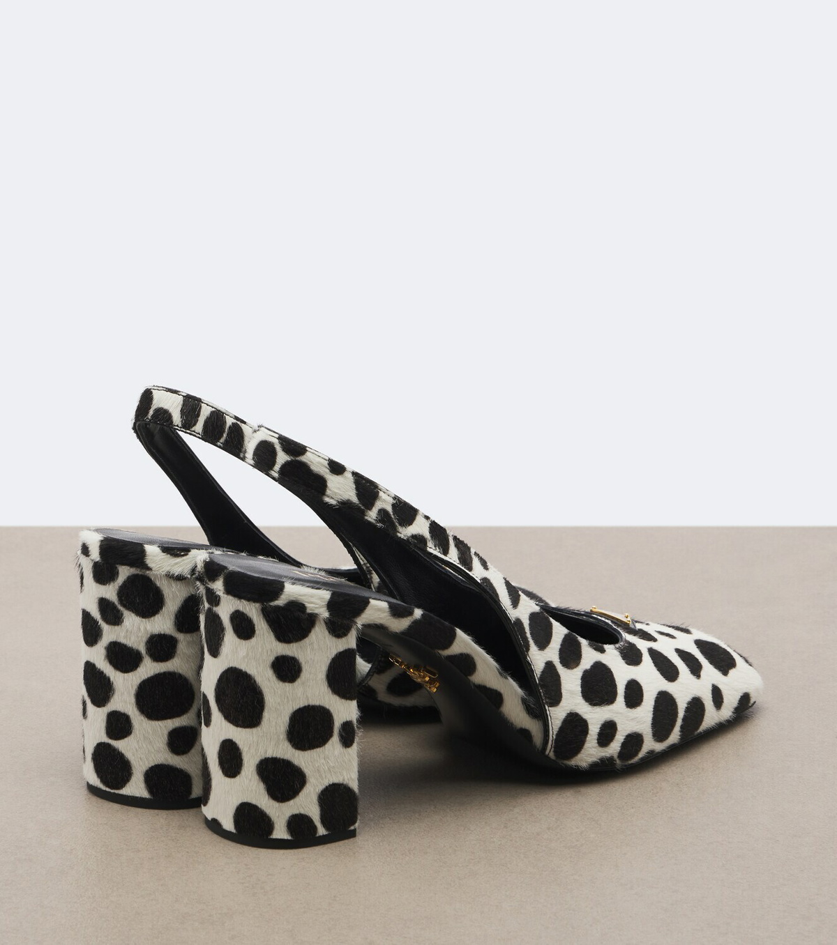 Prada Cow-print calf hair slingback pumps