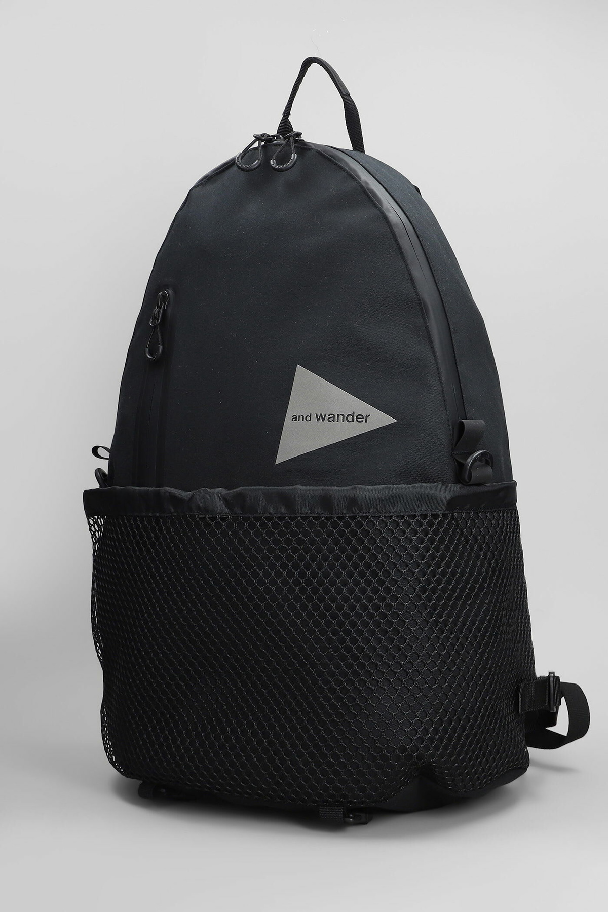 And Wander Backpack In Black Cotton and Wander