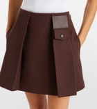Loewe Leather-trimmed pleated wool and silk miniskirt
