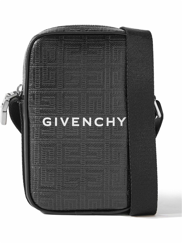 Photo: Givenchy - Leather-Trimmed Logo-Embossed Coated-Canvas Messenger Bag