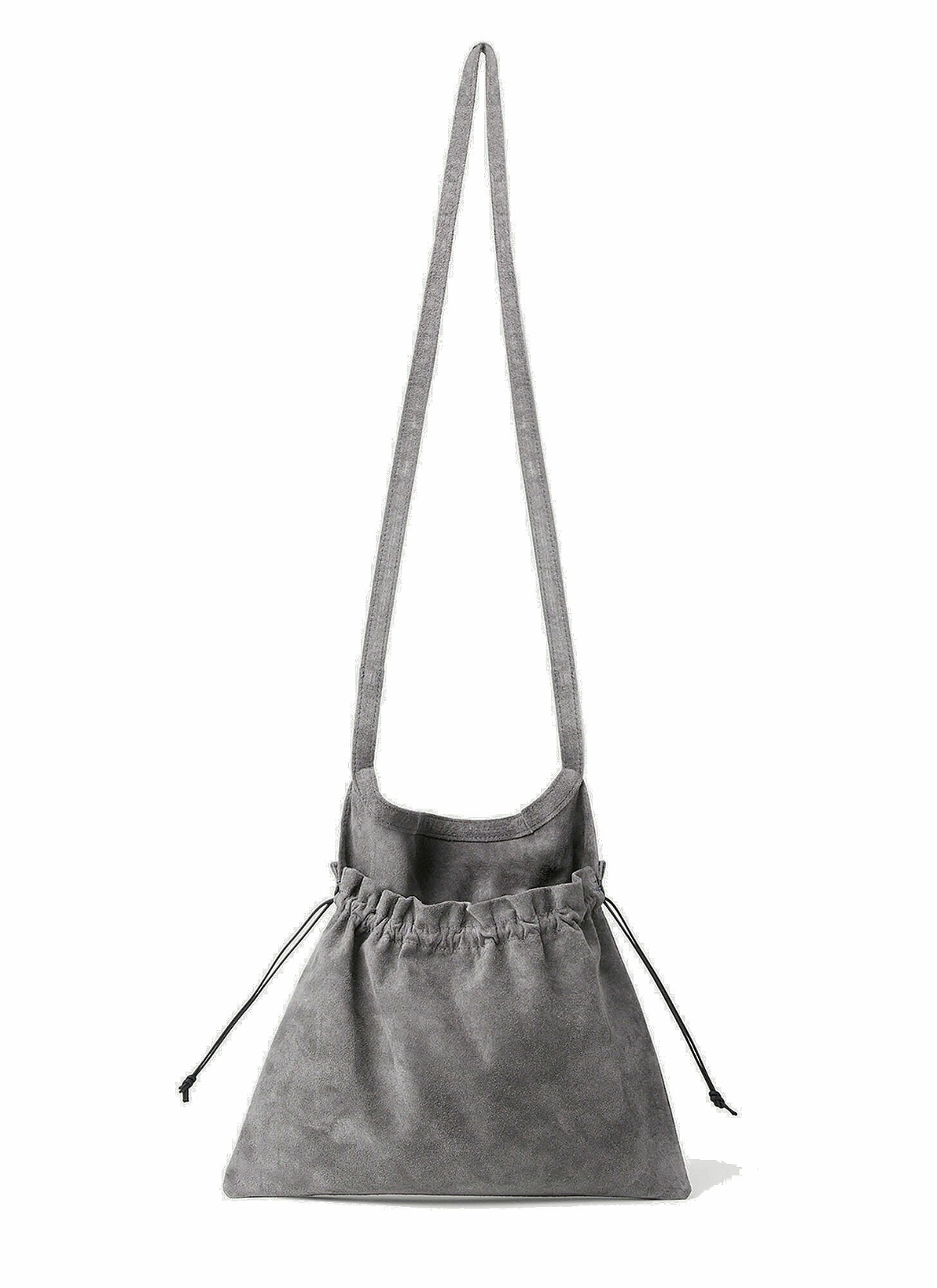 Photo: Hender Scheme - Small Drawstring Crossbody Bag in Grey