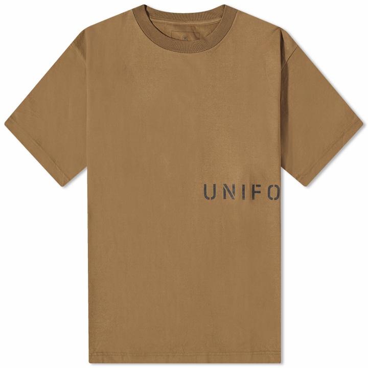 Photo: Uniform Experiment Men's Authentic Logo T-Shirt in Beige