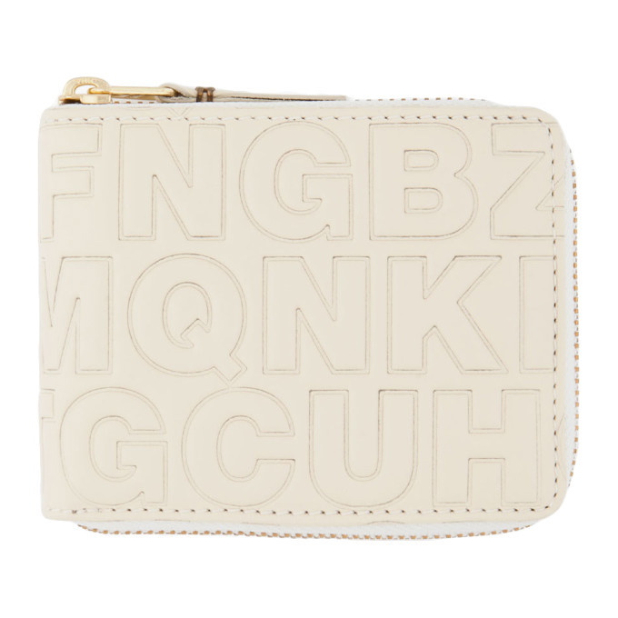 Photo: Comme des Garcons Wallets Cream Letter Embossed Wallet