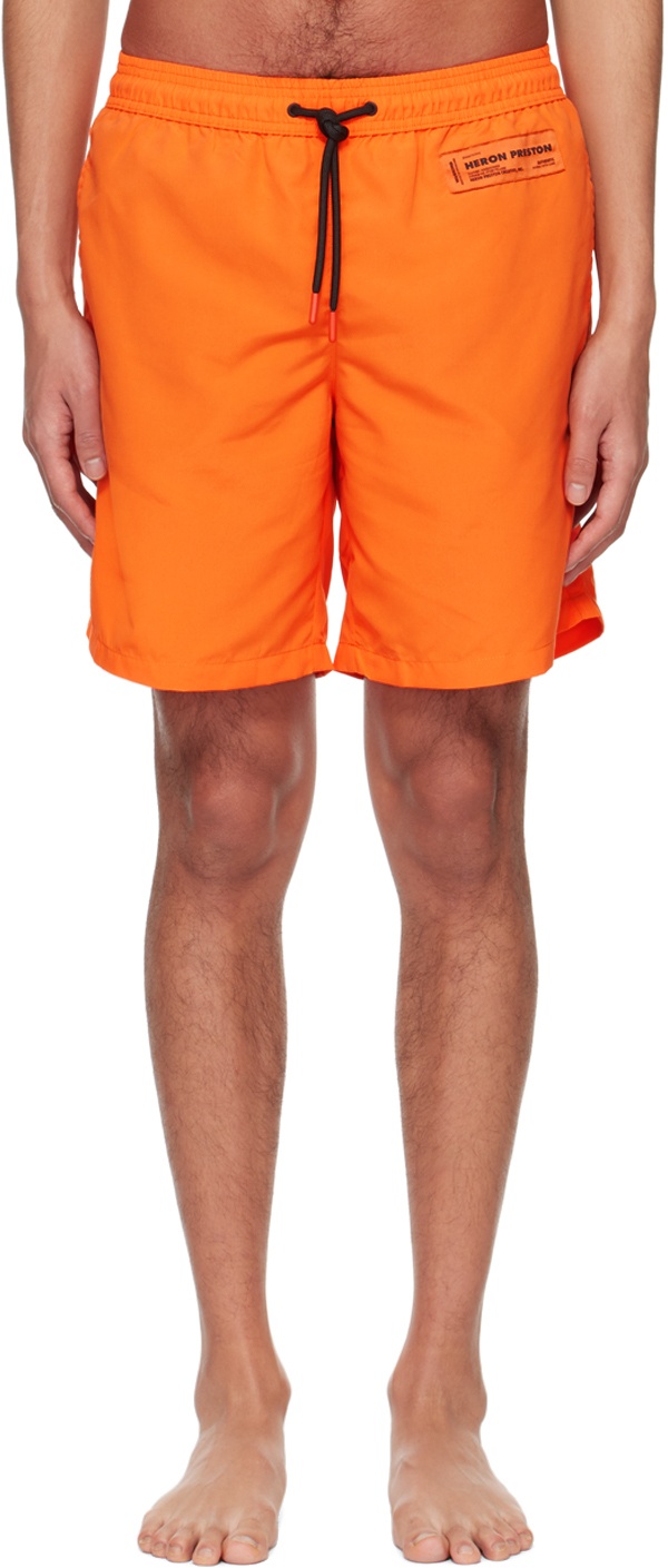 Photo: Heron Preston Orange Patch Swim Shorts