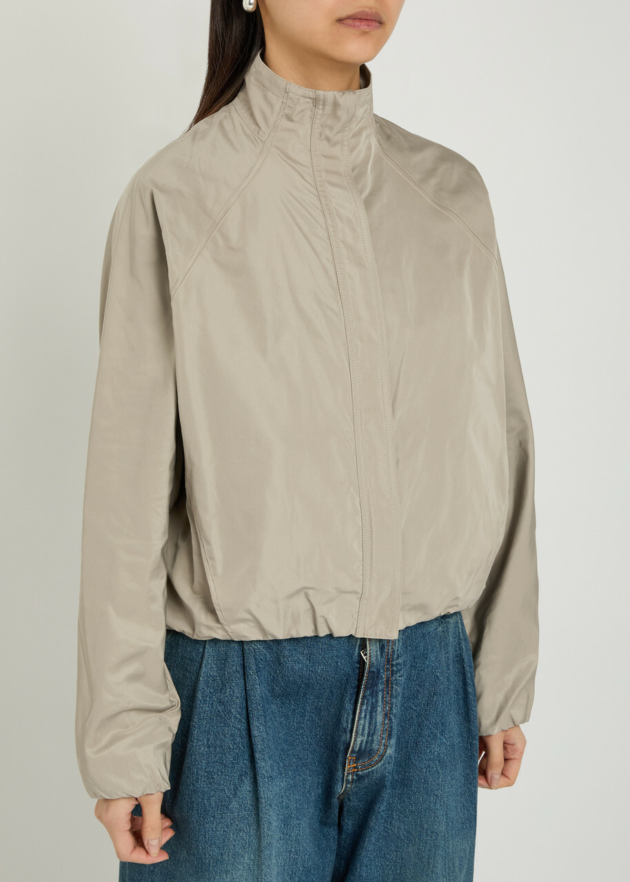 Alaïa High-neck Woven Windbreaker Jacket Beige