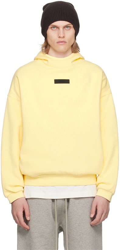 Photo: Fear of God ESSENTIALS Yellow Pullover Hoodie