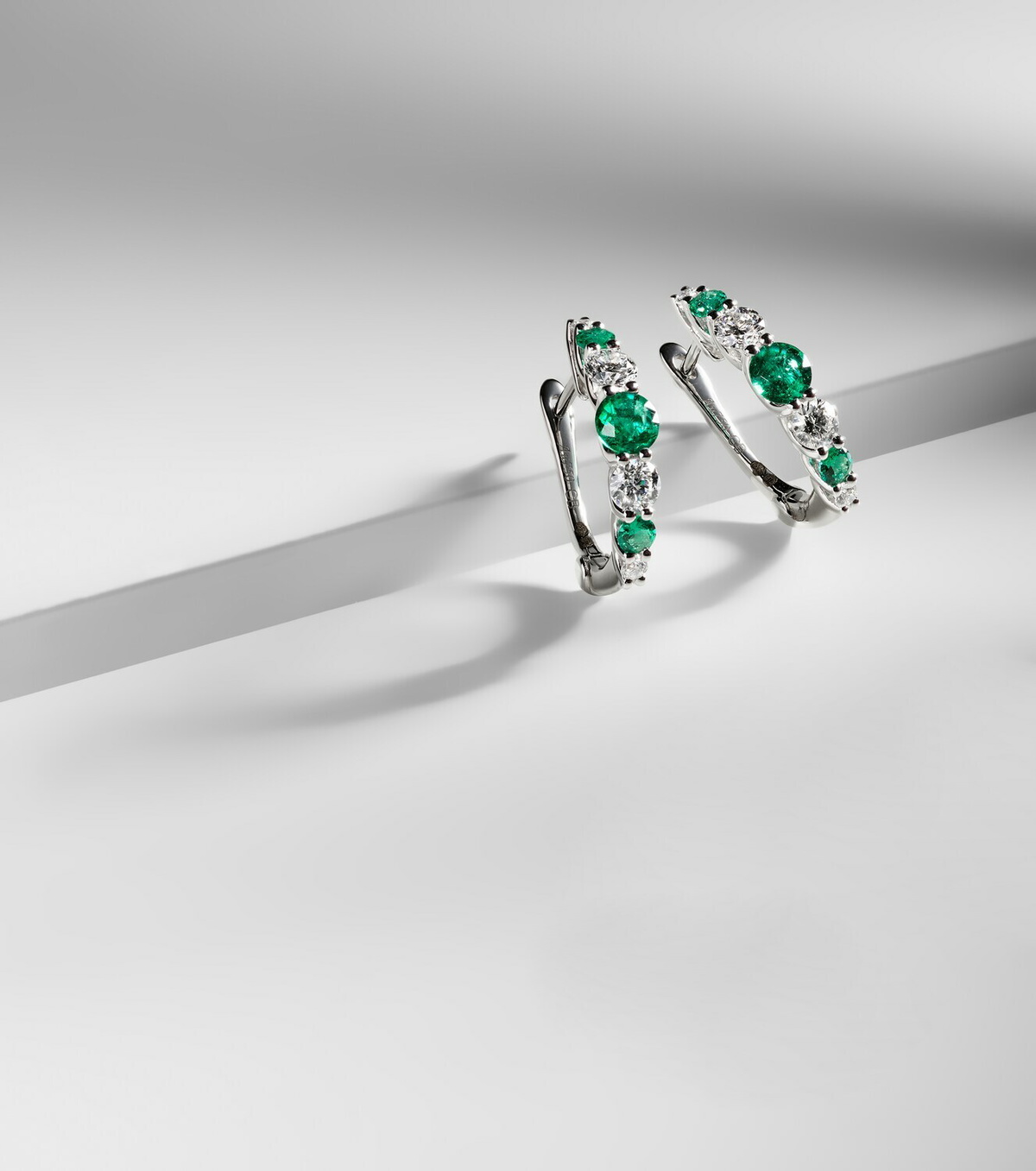 Bucherer Fine Jewellery Classics 18kt white gold hoop earrings with emeralds and diamonds
