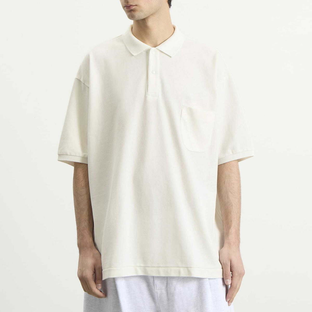 Nanamica Men's Snap Polo Shirt in Off White
