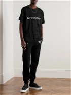 Givenchy - Slim-Fit Tapered Logo-Print Cotton-Jersey Sweatpants - Black