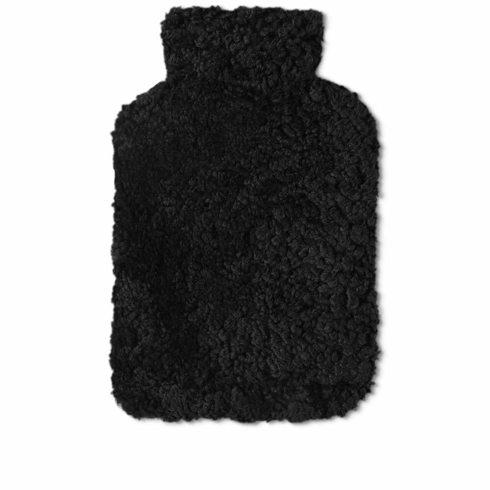 Photo: Natures Collection Short Curly Wool Hot Water Bottle in Black