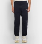 Balenciaga - Tapered Logo-Print Fleece-Back Cotton-Blend Jersey Sweatpants - Men - Navy