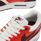 Nike Men's Air Max 1 Sneakers in Summite White/Burgundy/Red