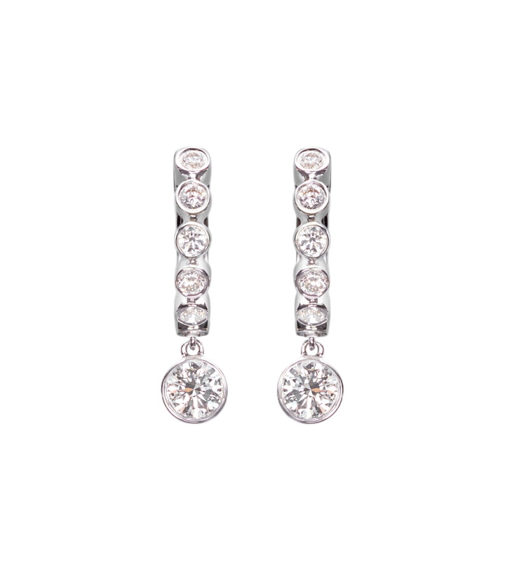 Photo: Anita Ko Melrose 18kt white gold huggie earrings with diamonds