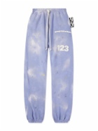 RRR123 - Gym Bag Logo-Print Paint-Splattered Cotton-Jersey Sweatpants - Purple