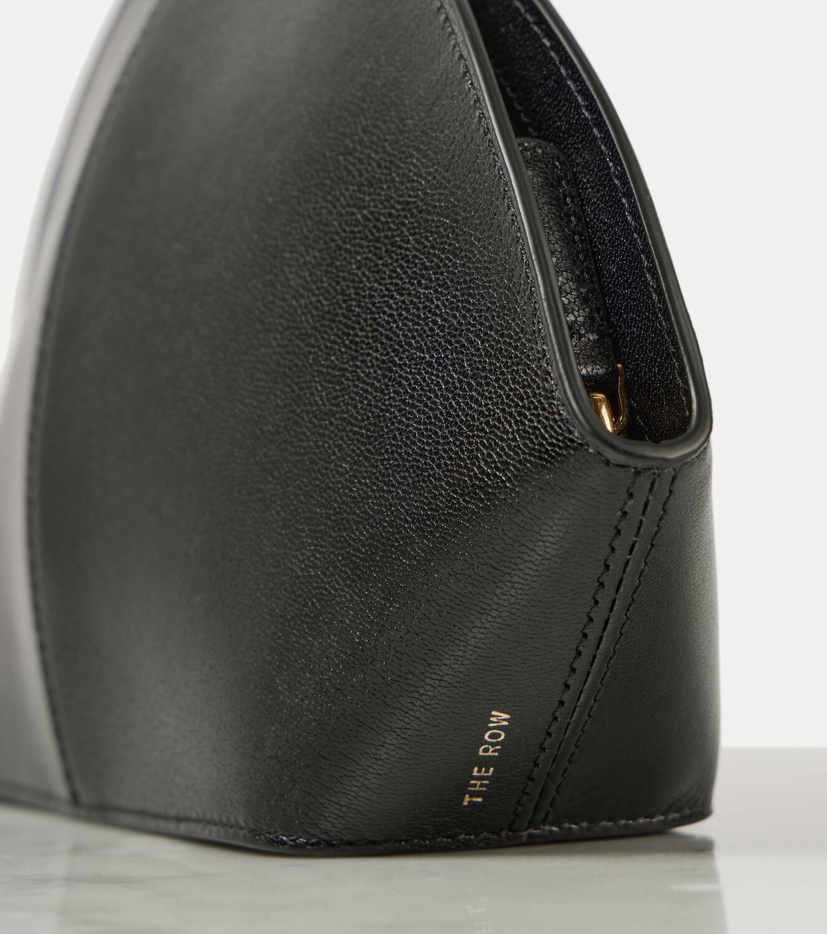 The Row Mel leather clutch The Row