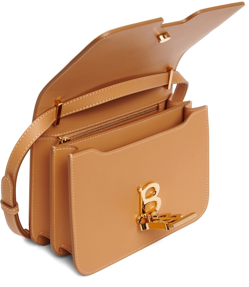 Antonia - Your bag fix. The tan Burberry TB bag is an on-trend