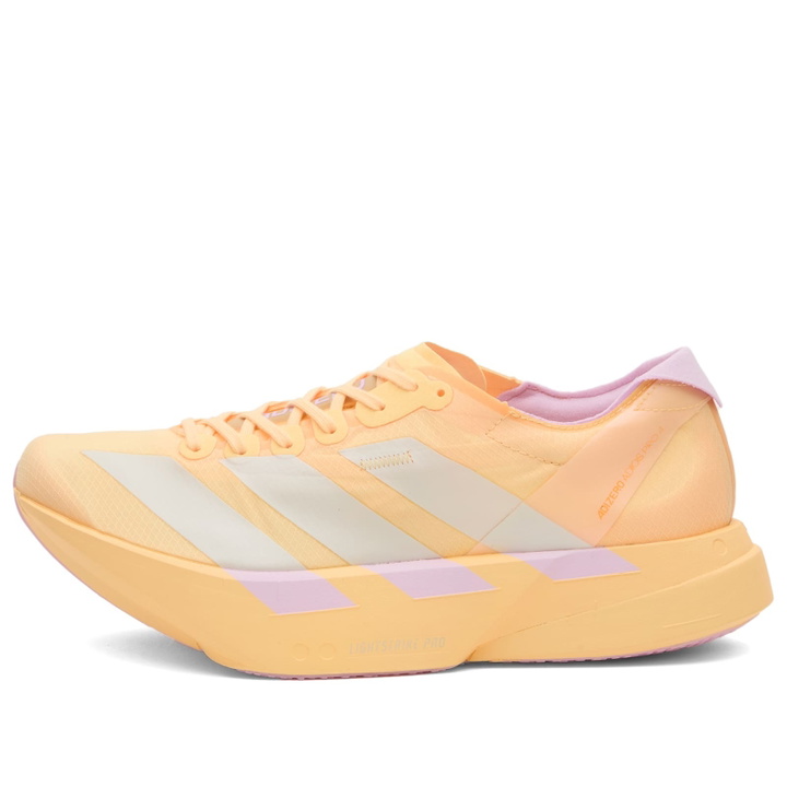 Photo: Adidas Running Women's adidas Adizero Adios Pro 4 W Sneaker in Ice Tangerine/Ice Gold Met/Bliss Lilac