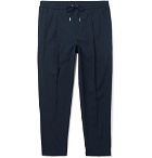 Moncler - Tapered Pleated Stretch-Cotton Drawstring Trousers - Navy