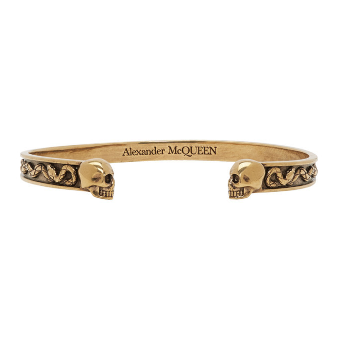 Photo: Alexander McQueen Gold Twin Skull Bracelet