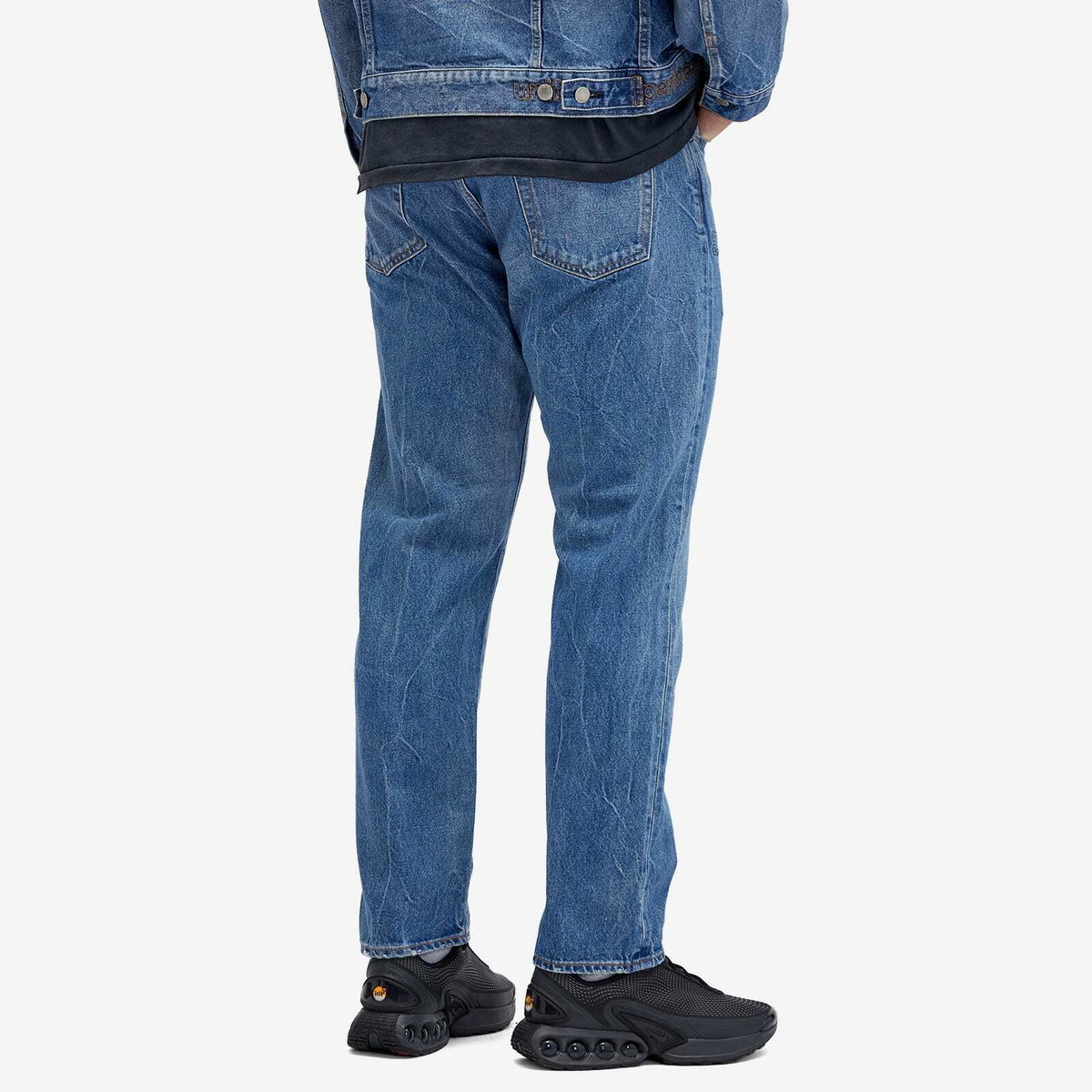 Uniform Experiment Men's Damaged Denim Jeans in Indigo