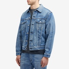Uniform Experiment Men's Denim Trucker Jacket in Indigo