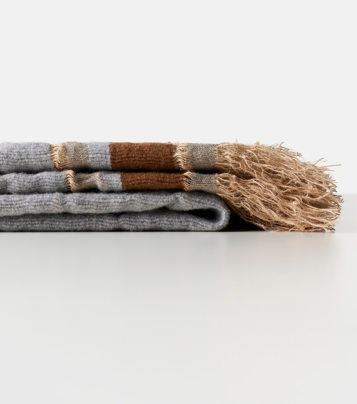 The House of Lyria Xoroi striped jute and wool-blend throw