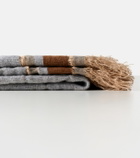 The House of Lyria Xoroi striped jute and wool-blend throw