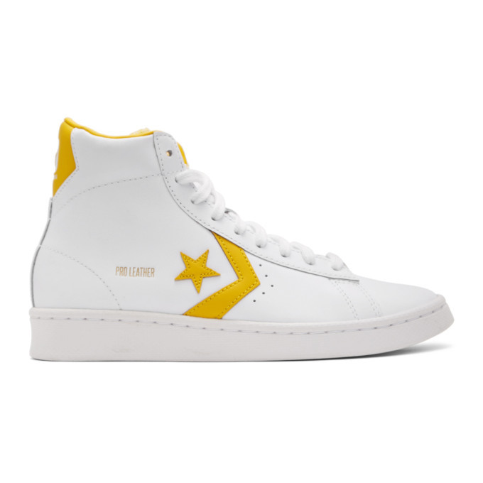 Photo: Converse White and Yellow Leather Pro Mid Sneakers