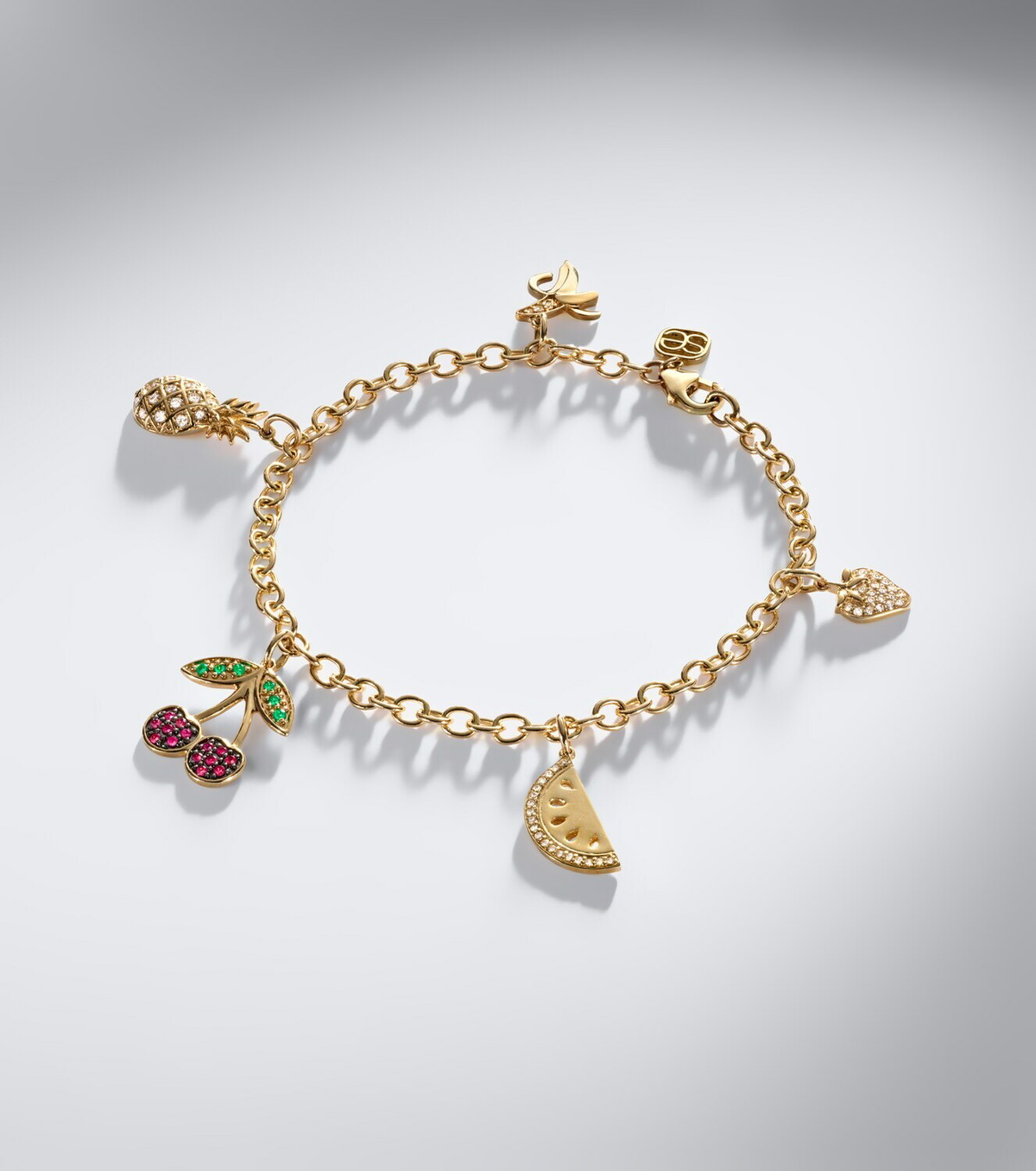 Sydney Evan 14kt gold charm bracelet with gemstones