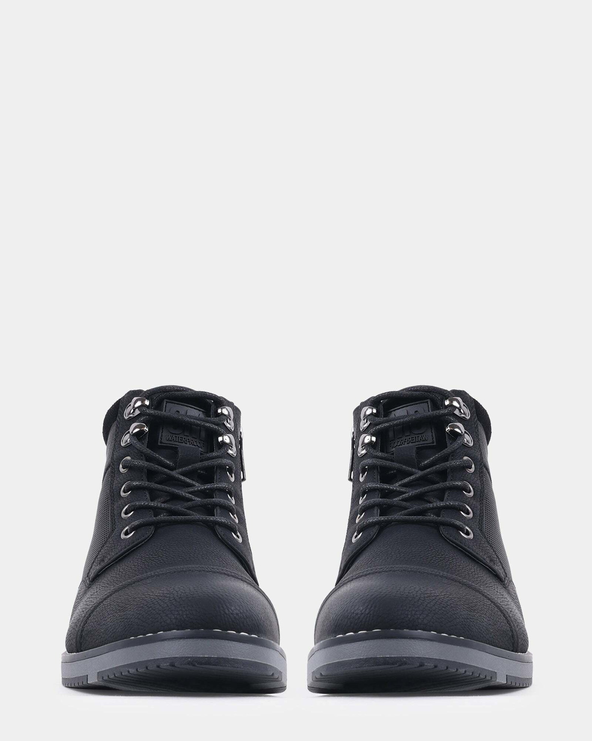 Steve Madden Mentor Boots in Black