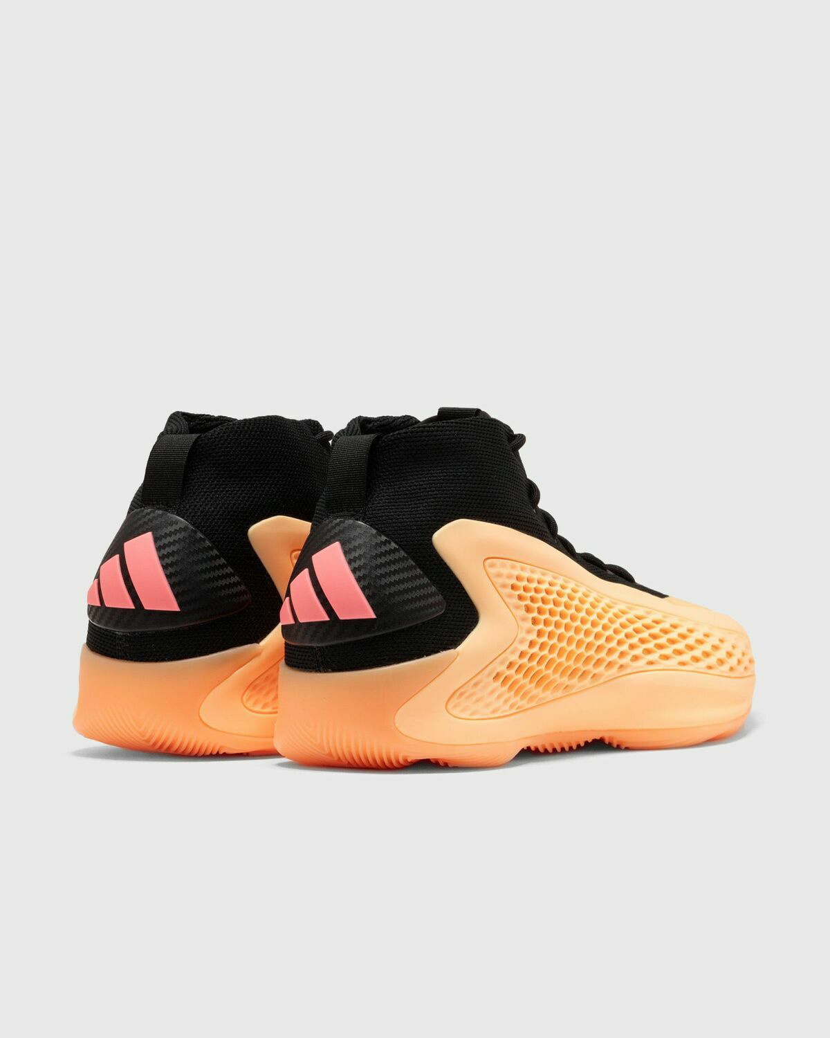orange and black adidas basketball shoes