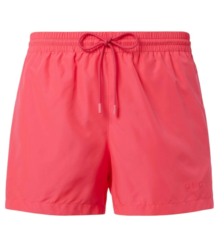Photo: Gucci Mid-rise swim trunks