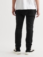 AMIRI - Slim-Fit Tapered Logo-Embroidered Cotton-Jersey Sweatpants - Black