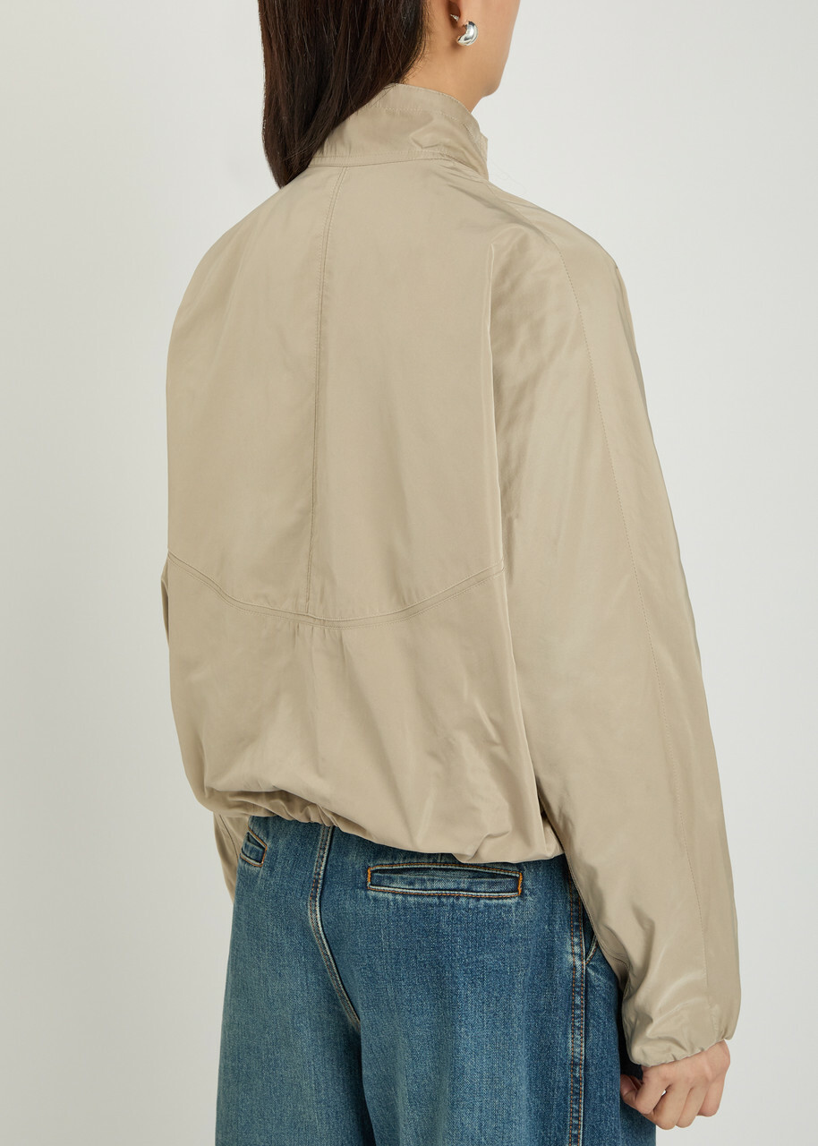 Alaïa High-neck Woven Windbreaker Jacket Beige