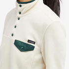 Sporty & Rich Women's Buttoned Polar Fleece Sweatshirt in Cream