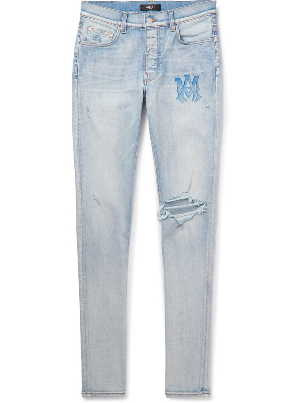 Photo: AMIRI - Skinny-Fit Logo-Print Distressed Jeans - Blue