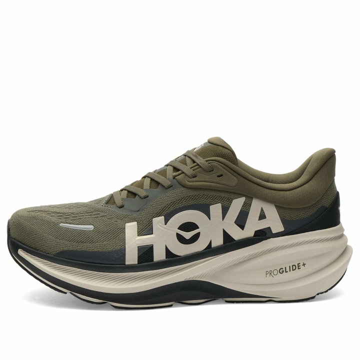 Photo: Hoka One One Men's Clifton Pro Sneaker in Antique Olive/River Rock Grey