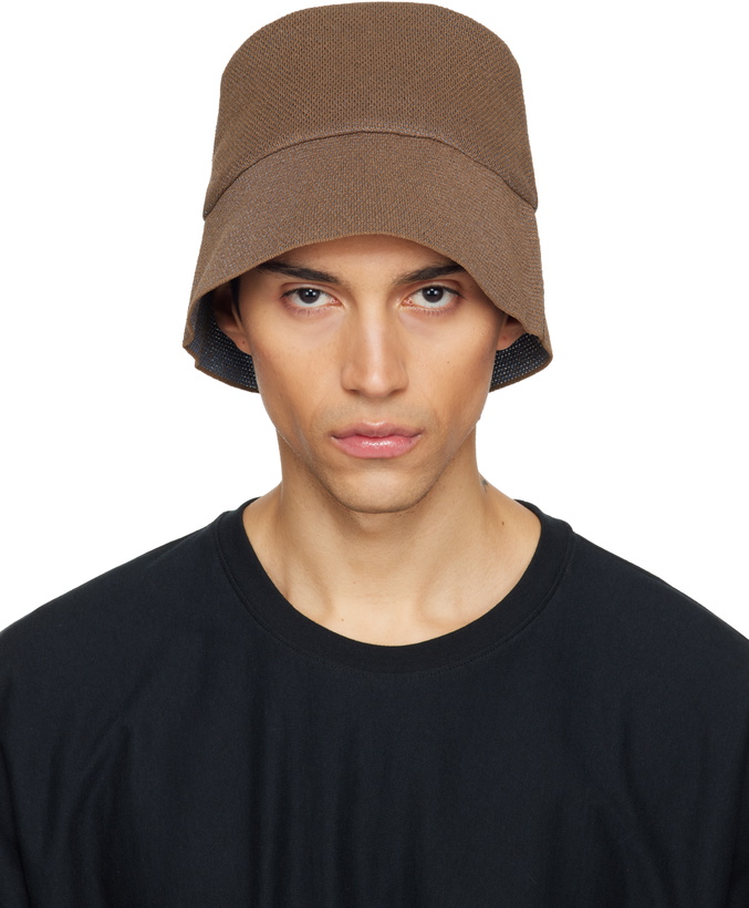 Photo: HOMME PLISSÉ ISSEY MIYAKE Brown Washi Bucket Hat