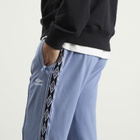 Umbro Men's Taped Track Pant in Infinity
