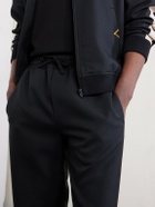 Valentino Garavani - Tapered Logo-Appliqued Striped Drill Sweatpants - Black