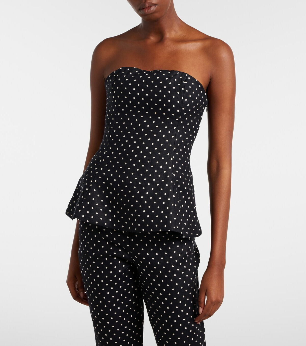 Faithfull Petro polka-dot peplum linen top