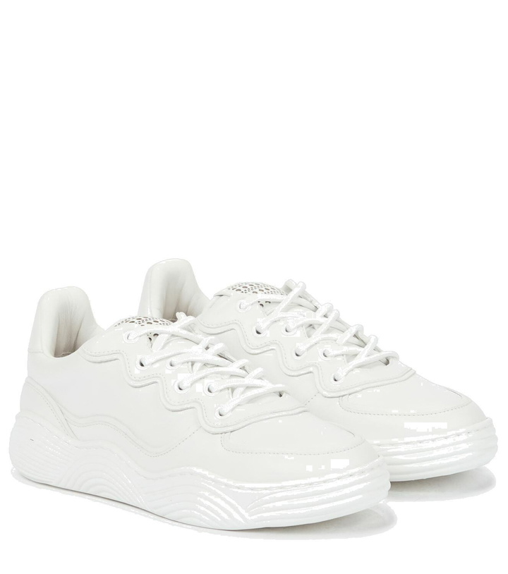 Photo: Alaïa Laser-cut leather sneakers