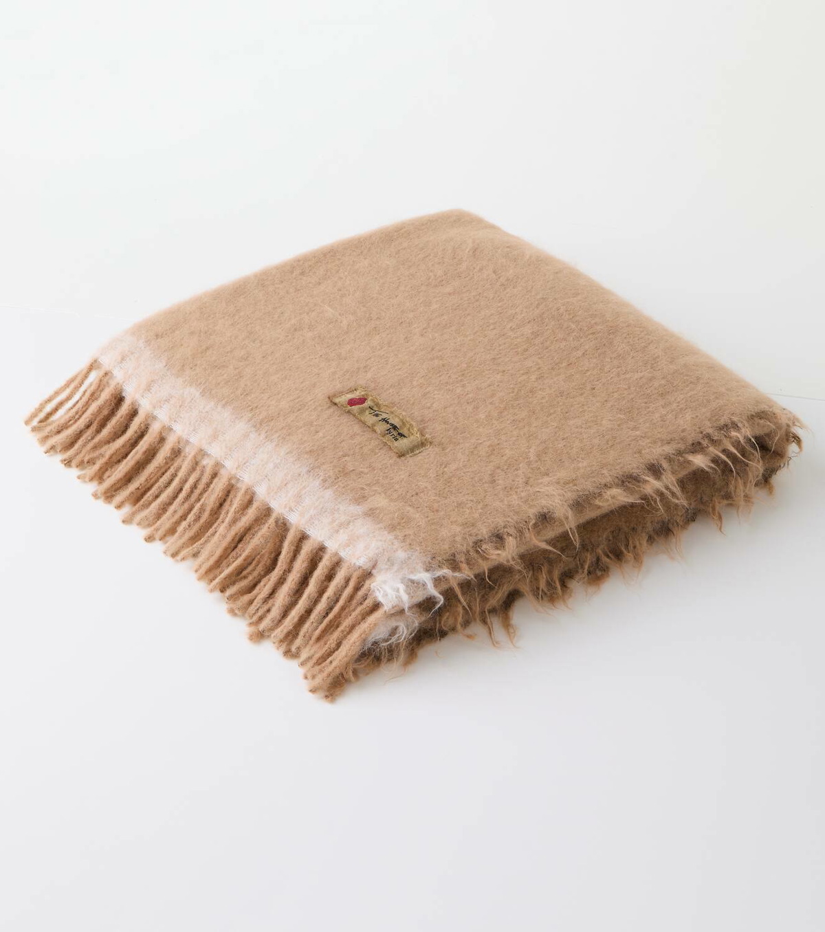 The House of Lyria Amaranto alpaca wool-blend throw