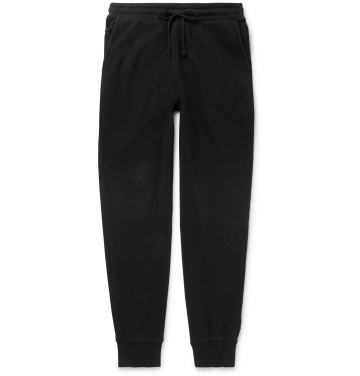 Photo: Holiday Boileau - Slim-Fit Tapered Fleece-Back Cotton-Jersey Sweatpants - Black