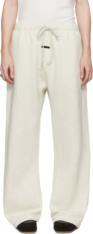 Photo: Fear of God ESSENTIALS Gray Signature Flared Sweatpants