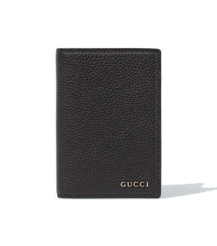 Photo: Gucci Logo leather passport holder
