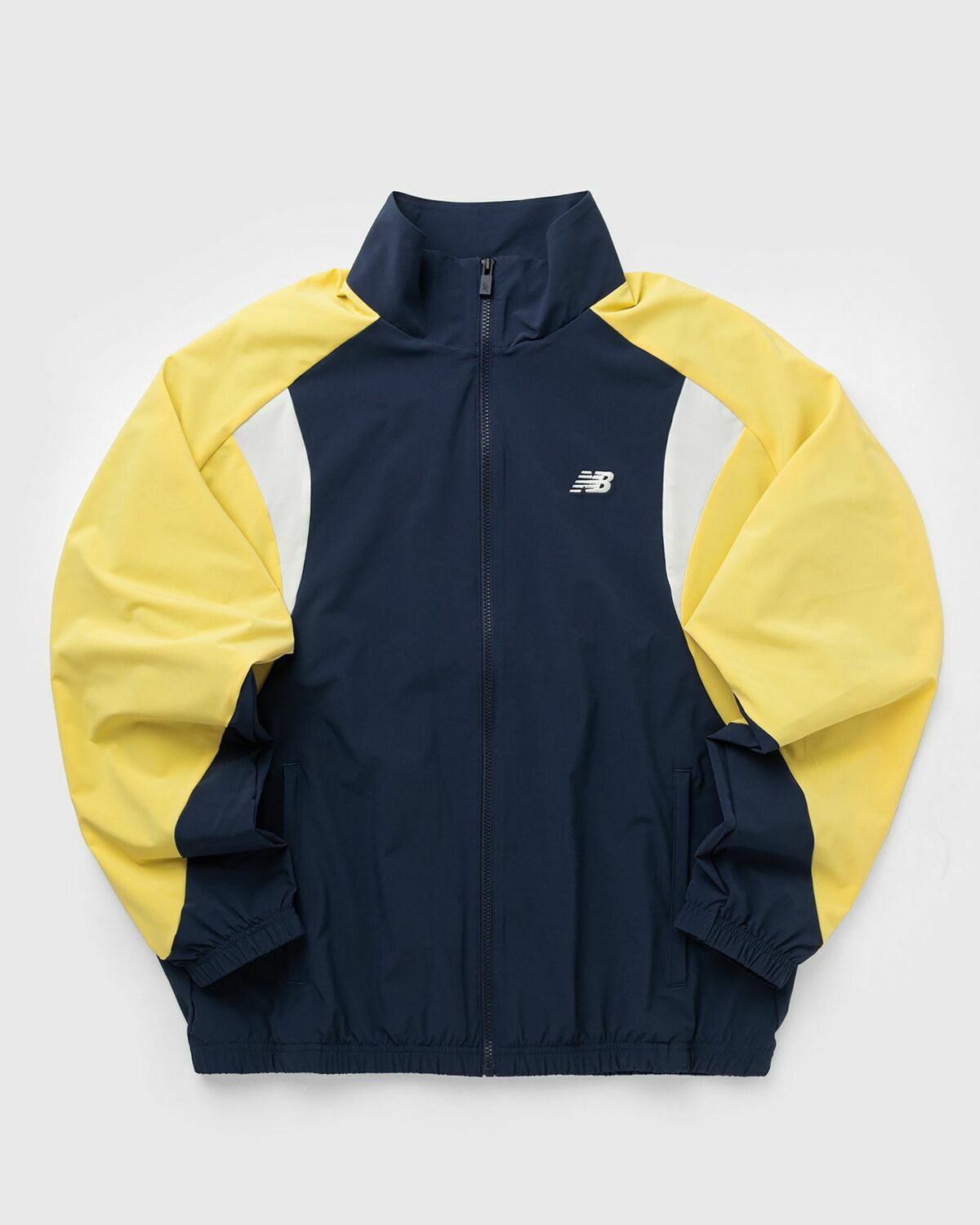 New Balance In Game Woven Track Jacket blue/yellow Men