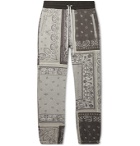 AMIRI - Tapered Bandana-Print Cotton-Jersey Drawstring Sweatpants - Gray